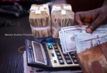 Nigerian Naira Maintains Resilience as Official Exchange Rate Dips Below 1,400